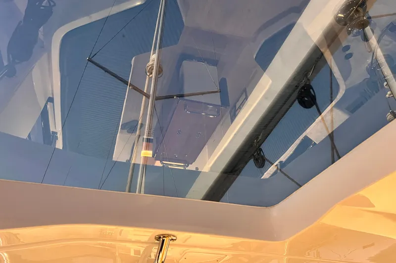 Slide: The Image of 2024 Hylas H57 yacht interior view through skylight, showcasing sleek design and modern features. - 42