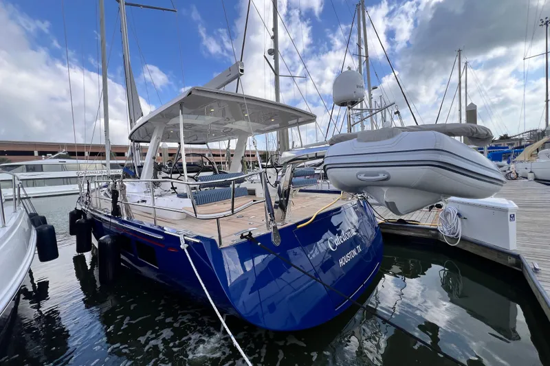 Slide: The Image of 2024 Hylas H57 yacht docked, featuring sleek design and modern amenities. - 48