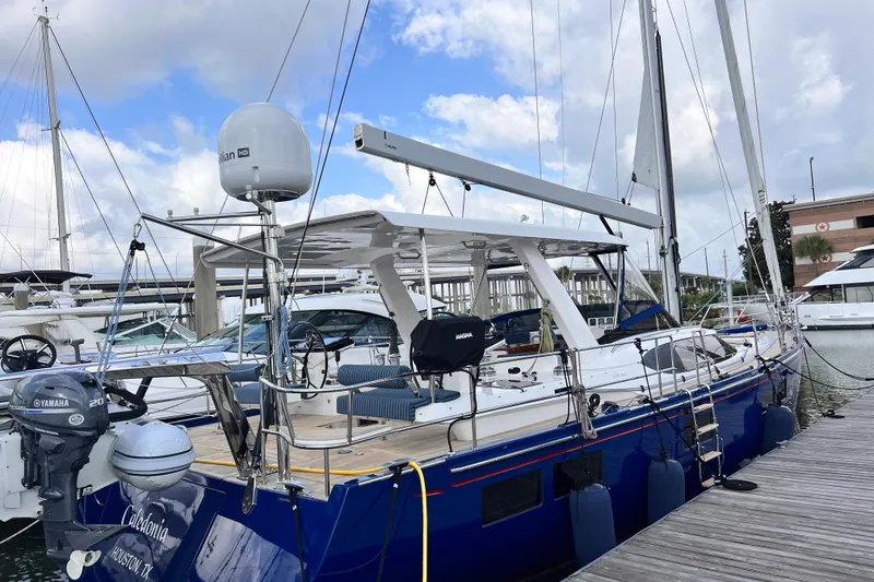 Slide: The Image of 2024 Hylas H57 yacht docked at marina, featuring sleek design and modern equipment. - 50