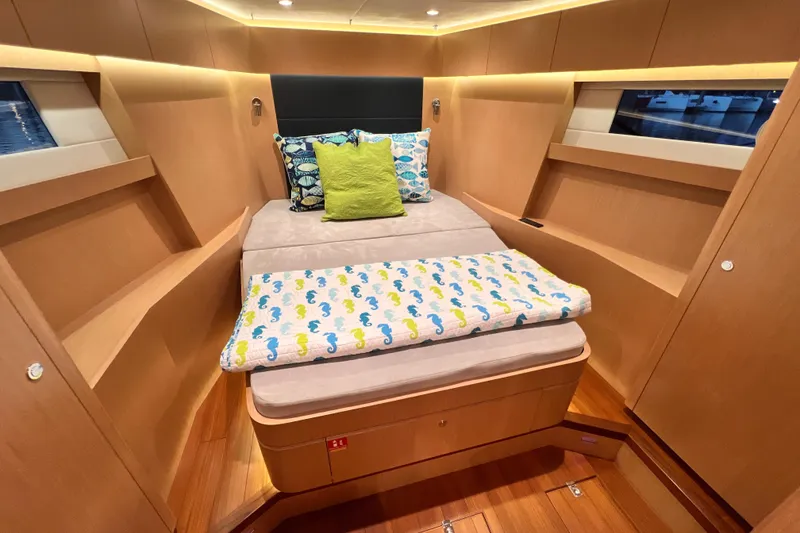 Slide: The Image of Luxurious cabin interior of 2024 Hylas H57 yacht with cozy bedding and modern design. - 6