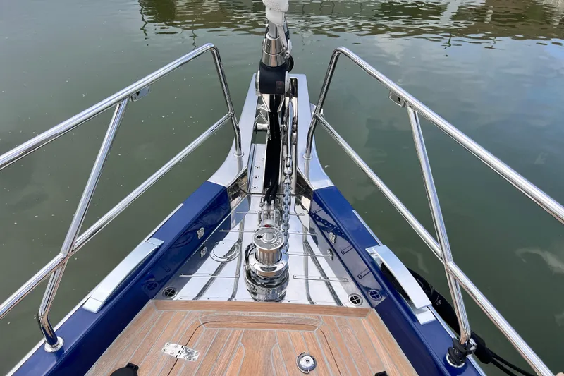 Slide: The Image of Bow of 2024 Hylas H57 yacht with polished metal fittings and wooden deck. - 78