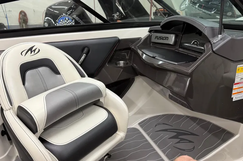 Slide: The Image of Interior of a 2014 Monterey 214SS Super Sport boat with Fusion audio system. - 12