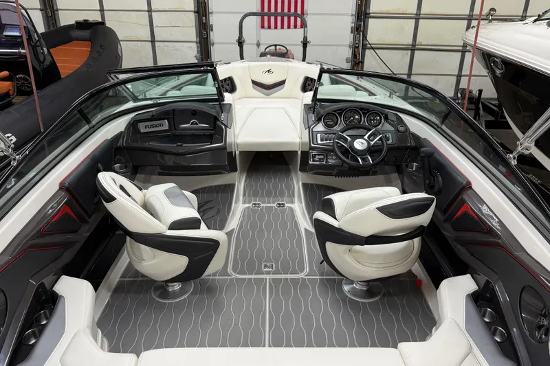 Slide: The Image of 2014 Monterey 214SS Super Sport boat interior with modern dashboard and seating. - 8