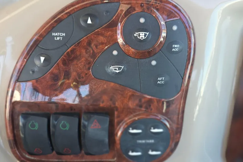 Slide: The Image of Control panel of a 2005 Sea Ray 340 Sundancer boat with wood finish. - 17