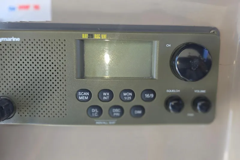 Slide: The Image of Raymarine radio system on 2005 Sea Ray 340 Sundancer boat dashboard. - 18