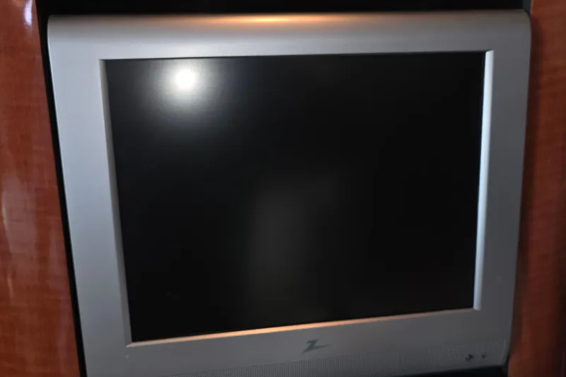 Slide: The Image of Flat screen TV on 2005 Sea Ray 340 Sundancer yacht interior. - 23