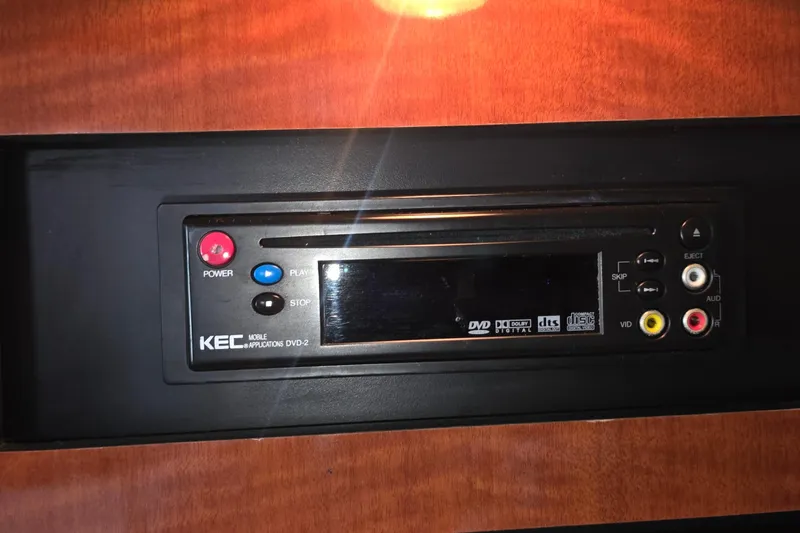 Slide: The Image of KEC DVD player in 2005 Sea Ray 340 Sundancer boat interior. - 24