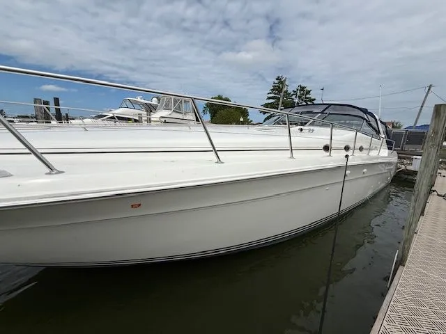 The Image of 1998 Sea Ray 500 Sundancer docked, side view. - 0