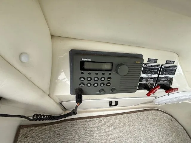 Slide: The Image of Raytheon radio on 1998 Sea Ray 500 Sundancer. - 13