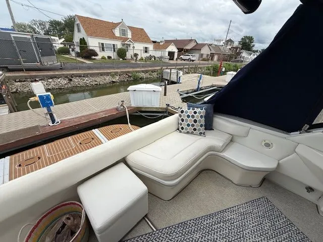 Slide: The Image of Interior of a 1998 Sea Ray 500 Sundancer yacht at dock. - 18