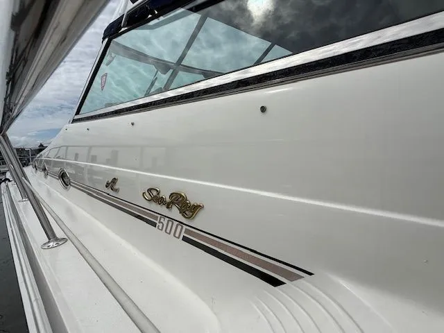 Slide: The Image of 1998 Sea Ray 500 Sundancer boat, side view with logo. - 3