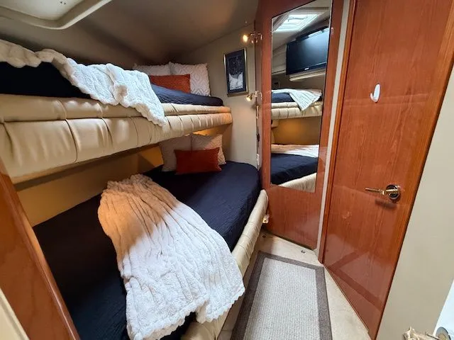 Slide: The Image of Interior of 1998 Sea Ray 500 Sundancer with bunk beds. - 31