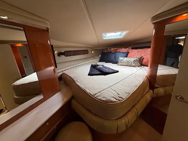 Slide: The Image of Luxurious bedroom in a 1998 Sea Ray 500 Sundancer yacht. - 35