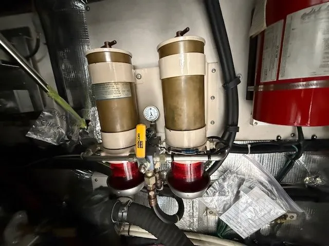 Slide: The Image of 1998 Sea Ray 500 Sundancer engine room with fuel filters. - 45