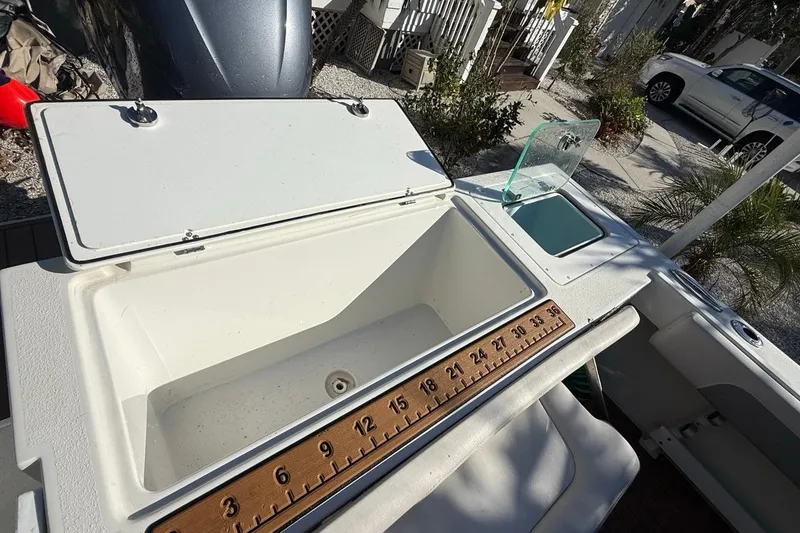 Slide: The Image of 2020 Parker 2320 SL Sport Cabin boat with spacious deck and cabin view. - 16