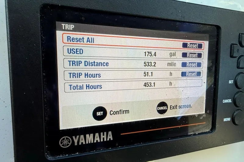 Slide: The Image of Garmin and Yamaha navigation displays on a 2020 Parker 2320 SL Sport Cabin boat. - 35