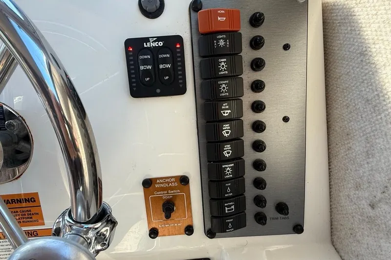 Slide: The Image of 2020 Parker 2320 SL Sport Cabin interior with navigation equipment and captain's chair. - 37