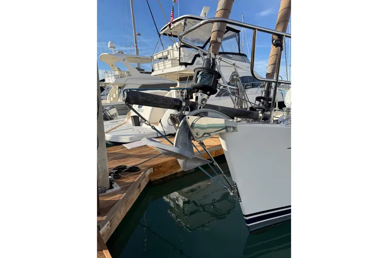 Slide: The Image of Sailboat docked with anchor, bowsprit and dolphin striker - 1