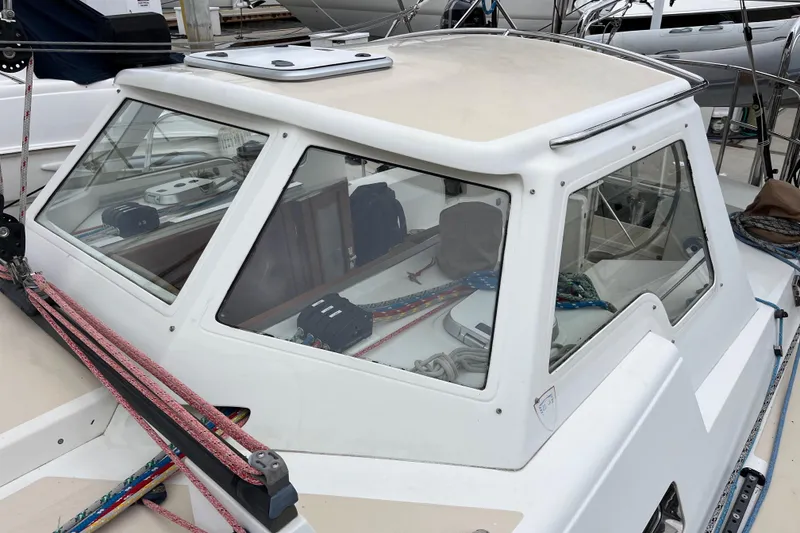 Slide: The Image of Outbound 46 sailboat cockpit with ropes and equipment, 2011 model. - 12