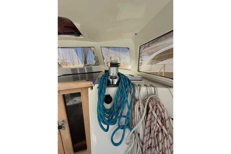 Slide: The Image of Interior of 2011 Outbound 46 sailboat with ropes and winch. - 15