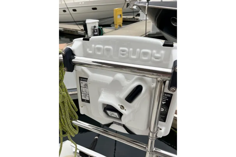 Slide: The Image of Jon Buoy safety equipment on 2011 Outbound 46 yacht at marina. - 21