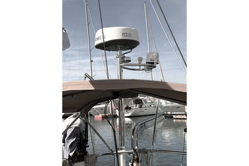Slide: The Image of Sailboat with radar equipment, Outbound 46, 2011 model, docked in marina. - 25