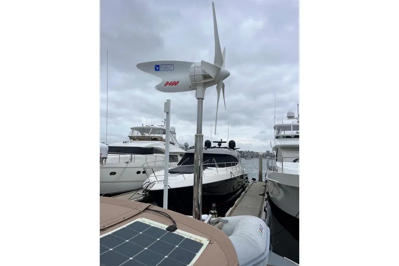 Slide: The Image of Docked yachts with D 400 wind generator and solar panel on Outbound 46 - 26