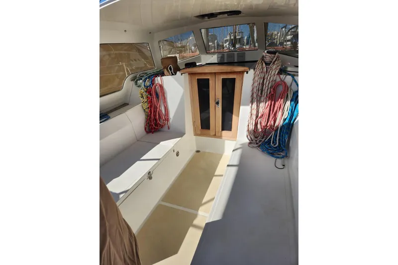Slide: The Image of Interior of 2011 Outbound 46 sailboat with seating and colorful ropes. - 31