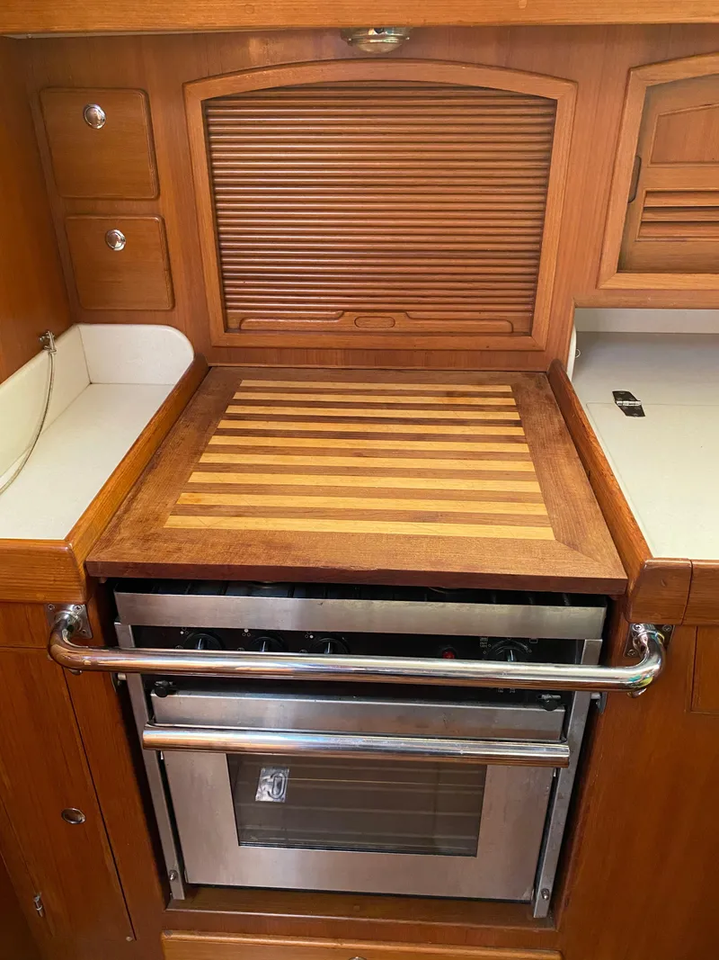 Slide: The Image of Cutting board cover for the galley stove - 39