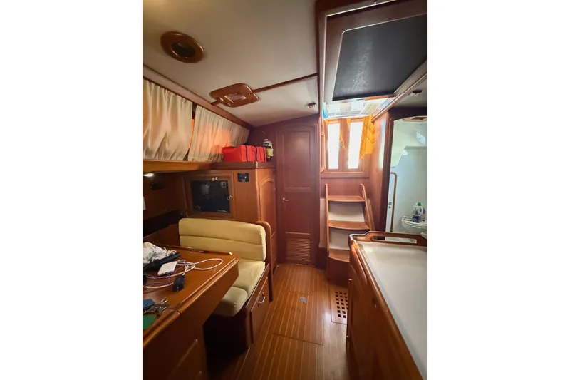 Slide: The Image of Looking aft with the nav station on starboard and the galley on port - 54