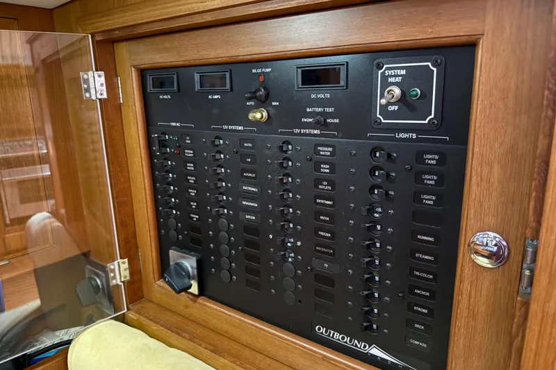 Slide: The Image of Electrical control panel on a 2011 Outbound 46 yacht - 58