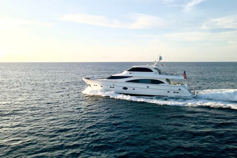 Slide: The Image of Aerial view of 2011 Horizon E88 yacht cruising on the ocean. - 15