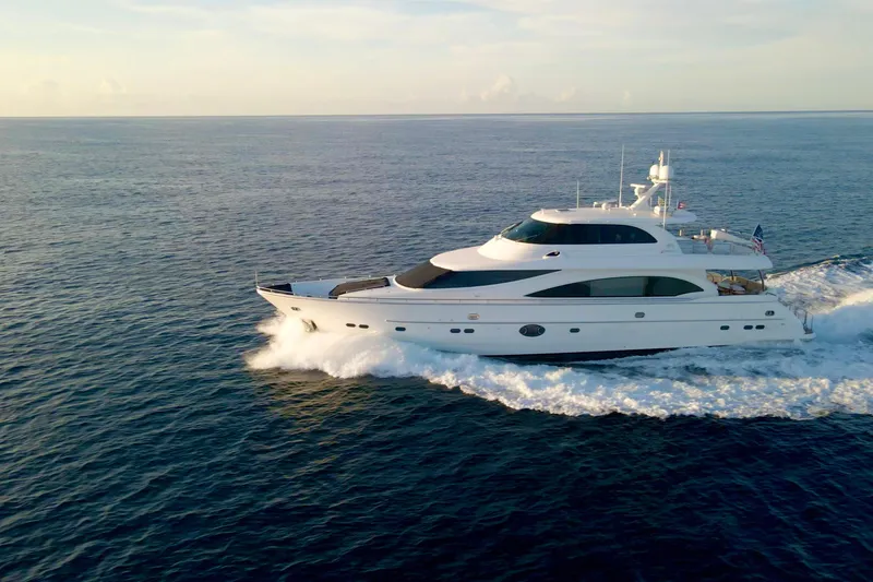 Slide: The Image of Luxurious 2011 Horizon E88 yacht cruising on serene blue waters. - 19