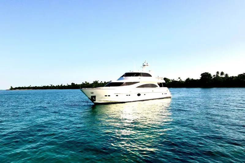 Slide: The Image of Luxury Horizon E88 yacht bow with sunbathing area, 2011 model, on clear blue water. - 28