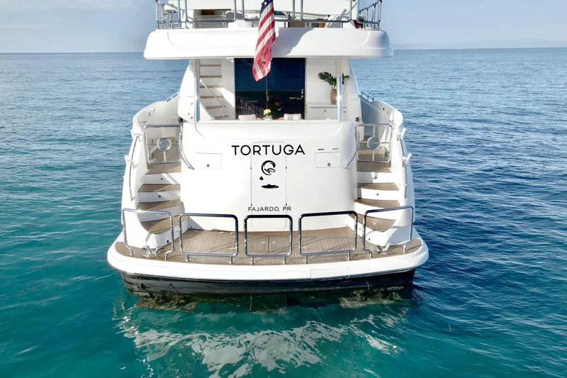 Slide: The Image of Aerial view of 2011 Horizon E88 yacht on clear turquoise water. - 31