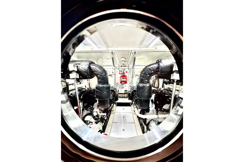 Slide: The Image of Luxurious yacht bathroom with modern fixtures, white towels, and orchid, Horizon E88, 2011 model. - 41