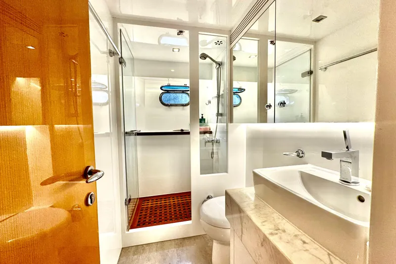 Slide: The Image of Luxurious bathroom on 2011 Horizon E88 yacht with modern fixtures and elegant design. - 51