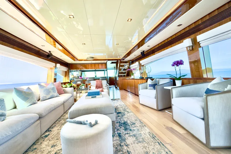 Slide: The Image of Luxurious interior of 2011 Horizon E88 yacht with elegant seating and panoramic ocean views. - 59