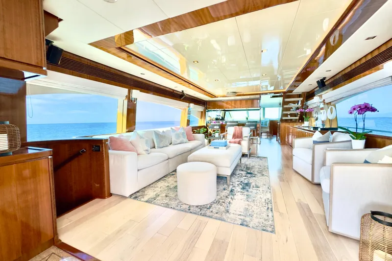 Slide: The Image of Luxurious interior of 2011 Horizon E88 yacht with ocean view, featuring elegant seating and decor. - 60