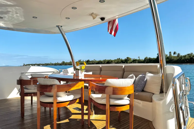 Slide: The Image of Luxurious Horizon E88 yacht deck with elegant seating and ocean view, 2011 model. - 69