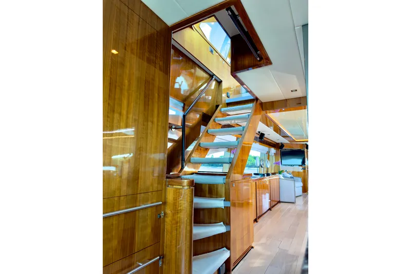 Slide: The Image of Luxurious interior of 2011 Horizon E88 yacht with wooden staircase and modern design. - 72
