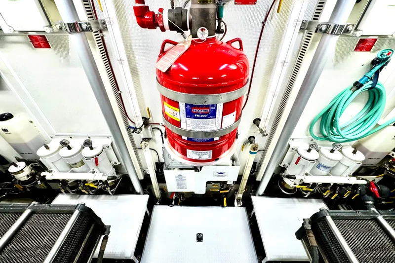 Slide: The Image of Engine room of 2011 Horizon E88 yacht with fire suppression system and equipment. - 91