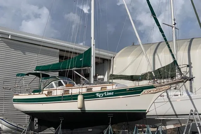 Slide: The Image of Sailboat "Key Lime" by Gozard, model 31, 1996, docked in a marina. - 2