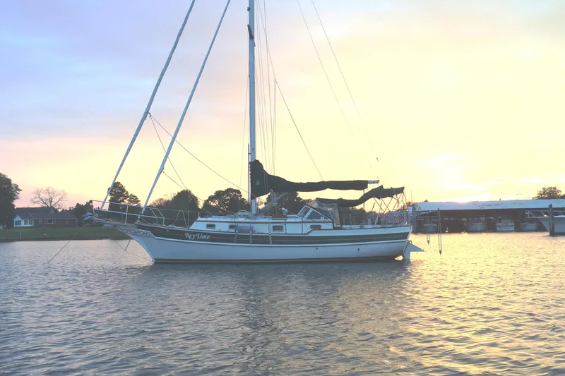 Slide: The Image of Sailboat "Key Lime" on water at sunset, Gozard 31, 1996 model. - 41