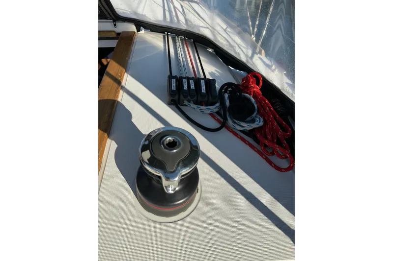 Slide: The Image of Winch and ropes on 2021 Jeanneau Sun Odyssey 349 sailboat deck. - 10