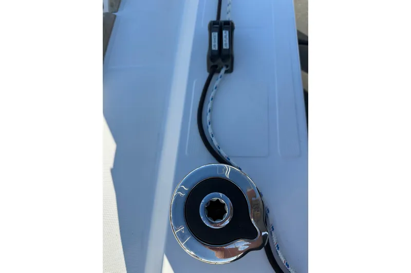 Slide: The Image of Jeanneau Sun Odyssey 349 deck detail, 2021 model, featuring a winch and rope. - 12