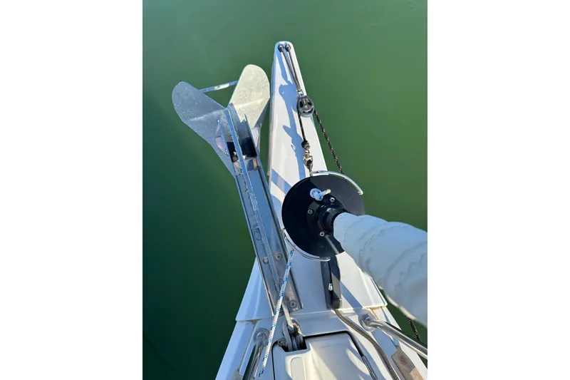 Slide: The Image of Bow view of 2021 Jeanneau Sun Odyssey 349 sailboat with anchor and rigging. - 30