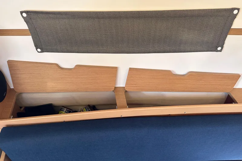 Slide: The Image of Interior storage compartments on a 2021 Jeanneau Sun Odyssey 349 sailboat. - 35