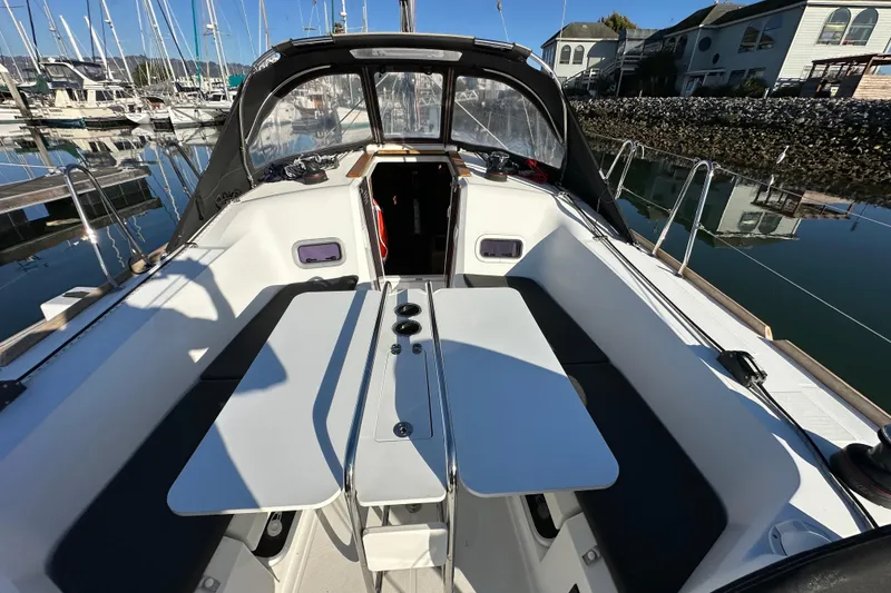 Slide: The Image of Cockpit of 2021 Jeanneau Sun Odyssey 349 sailboat docked at marina. - 5