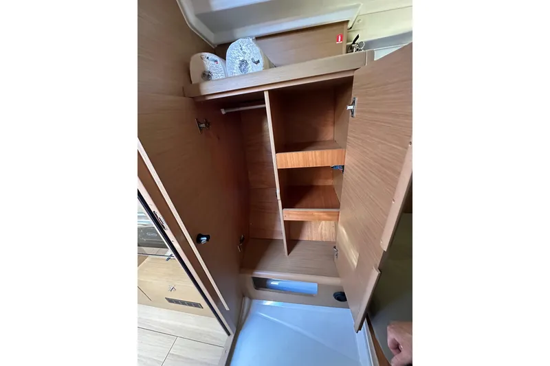 Slide: The Image of Interior storage cabinet of 2021 Jeanneau Sun Odyssey 349 sailboat. - 54